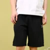 Pantaloni scurți din fleece cu croială standard și broderie în formă de stea, mărimi asiatice „Negru”